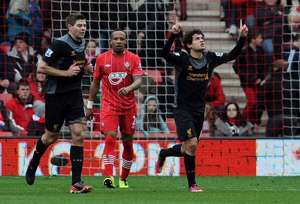 SOUTHAMPTON, ENGLAND - MARCH 16: (THE SUN OUT, THE SUN ON SUNDAY OUT) Philippe Coutinho of Liverpool celebrates after scoing a goal during the Barclays Premier League match between Southampton and Liverpool at St Mary's Stadium on March 16, 2013 in Southampton, England. (Photo by John Powell/Liverpool FC via Getty Images)